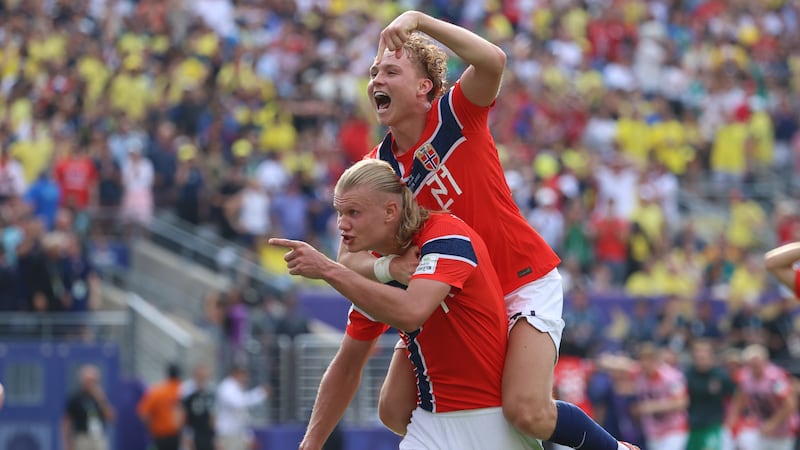 Norway's Erling Haaland (9) celebrates with Andreas Schjelderup (21) after scoring their...