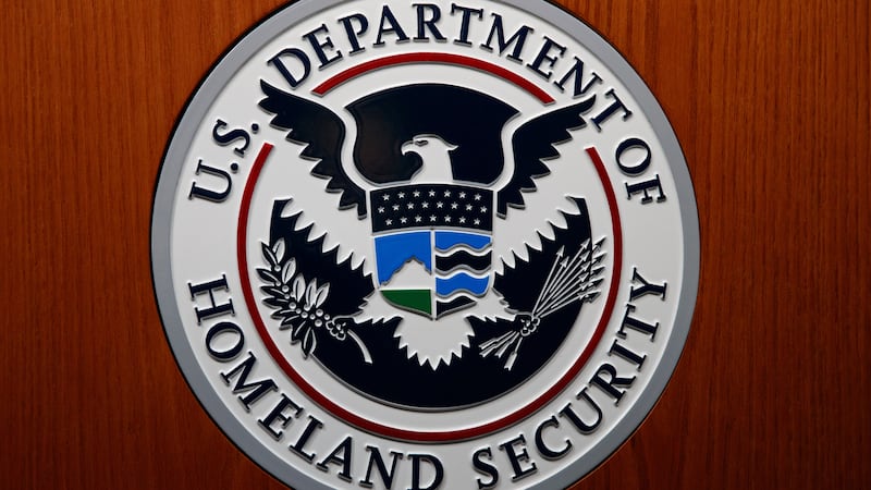 FILE - In this June 28, 2019, file photo the Department of Homeland Security (DHS) seal is...