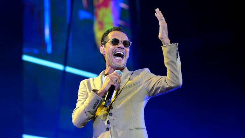 FILE - Marc Anthony performs during his Pa'lla Voy Tour in Rosemont, Ill. on Oct. 8, 2021....