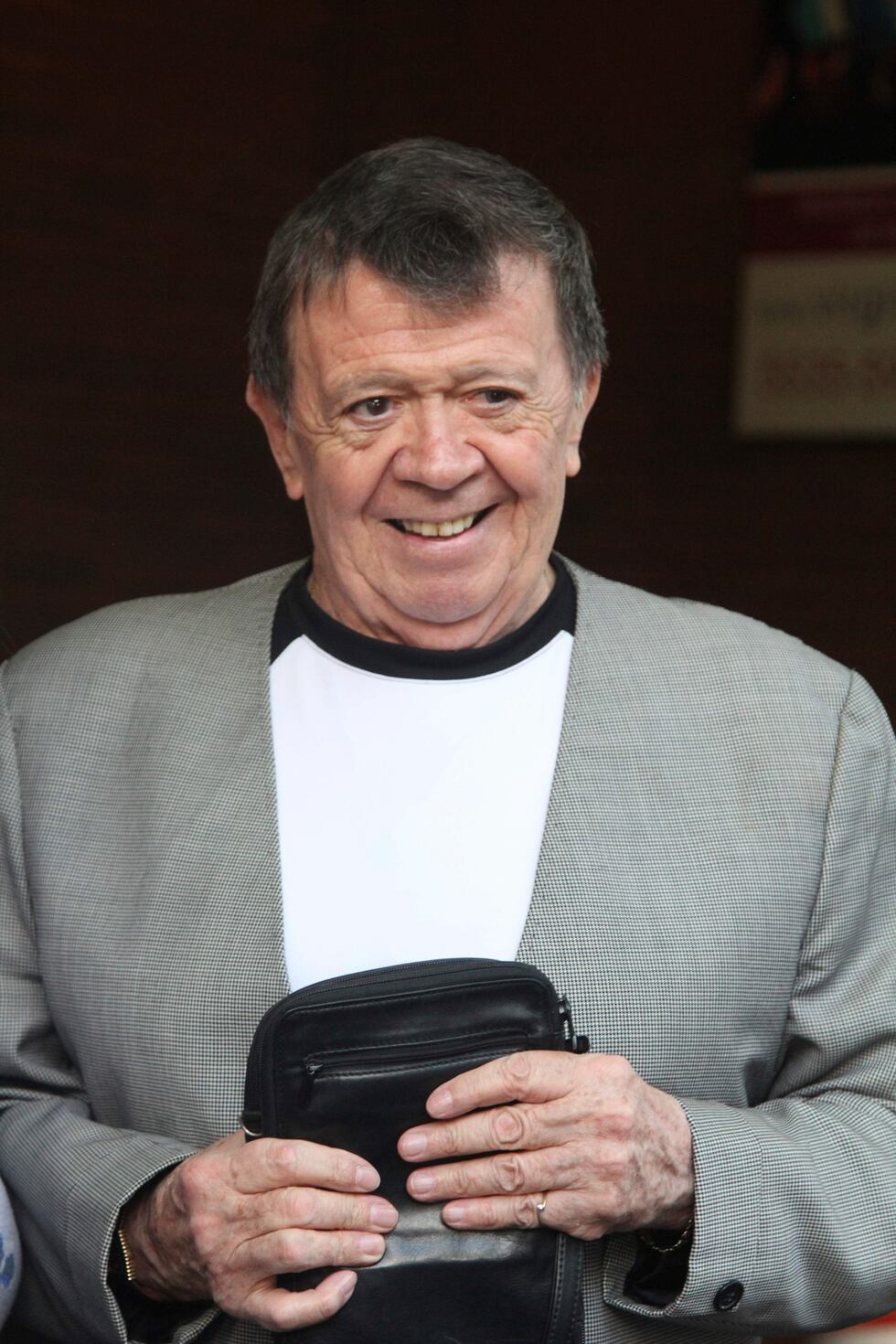 Xavier López "Chabelo" sonríe durante un evento en la Ciudad de México el 7 de agosto de 2014....