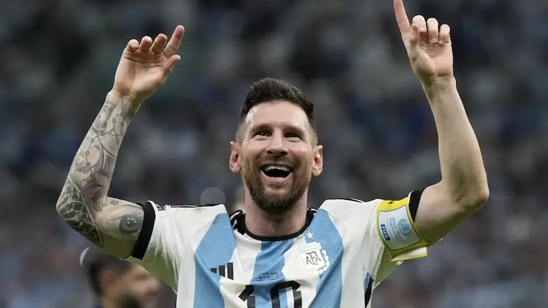 Argentina's Lionel Messi celebrates at the end of the World Cup quarterfinal soccer match...