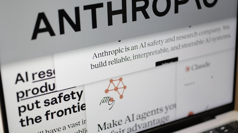 FILE - Pages from the Anthropic website and the company's logo are displayed on a computer...