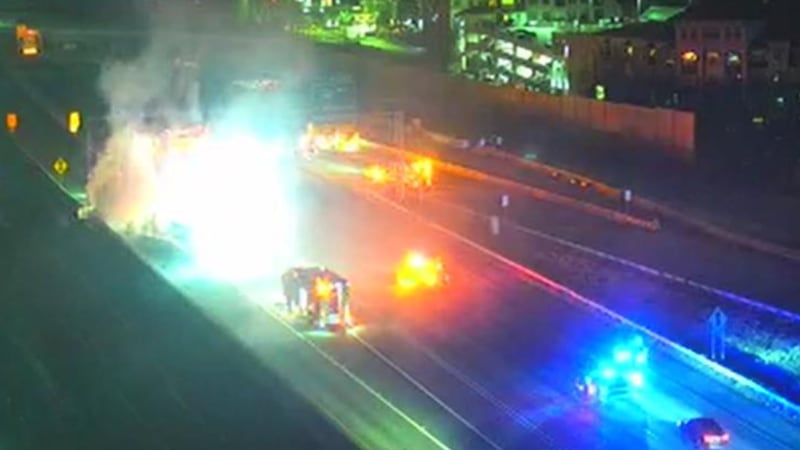 A stalled vehicle on fire has shut down all northbound lanes of I-75 near I-285 in Cobb County...