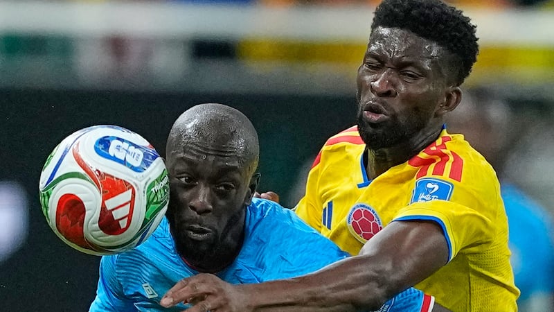 Congo's Yoane Wissa (20), left, and Colombia's Jefferson Lerma (16) battle for the ball during...