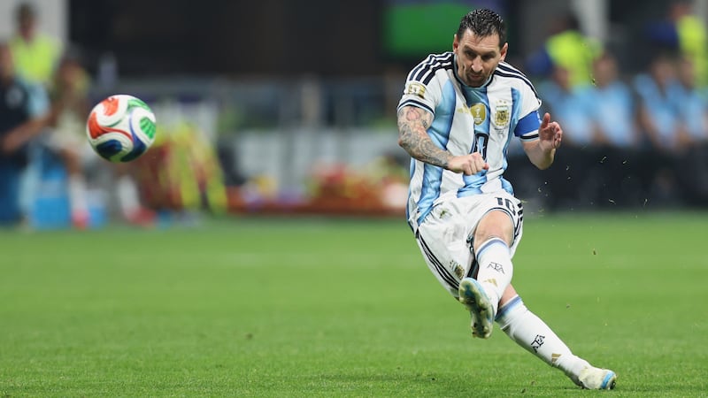Argentina's Lionel Messi takes a free kick during the World Cup round of 16 soccer match...