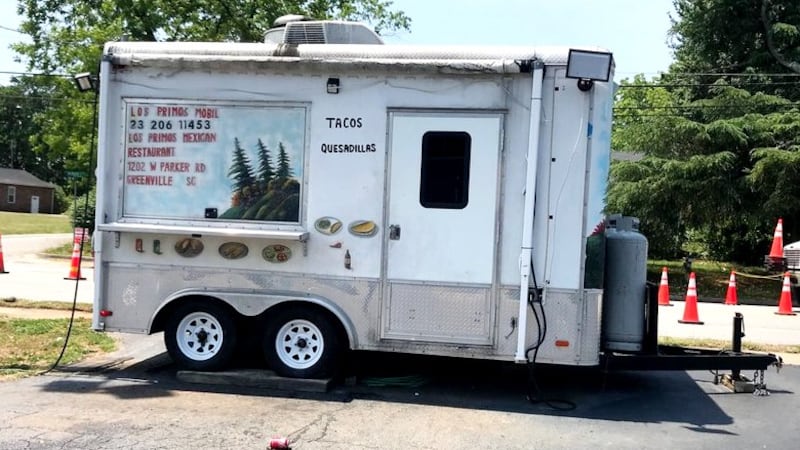 Taco truck outside Los Primos, a Greenville restaurant the Attorney General says was...