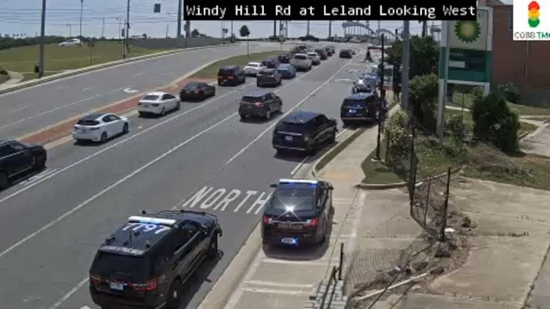 Cobb County police are searching for an armed suspect just off I-75 on Tuesday afternoon.