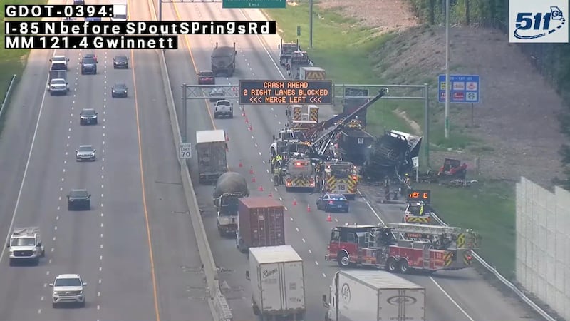 A tractor-trailer caught on fire while driving down I-85 on Thursday, according to state...