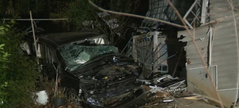 Car into DeKalb County house