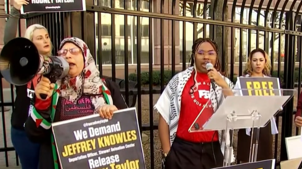 Atlanta activists protest against the deportation of Rodney Taylor.