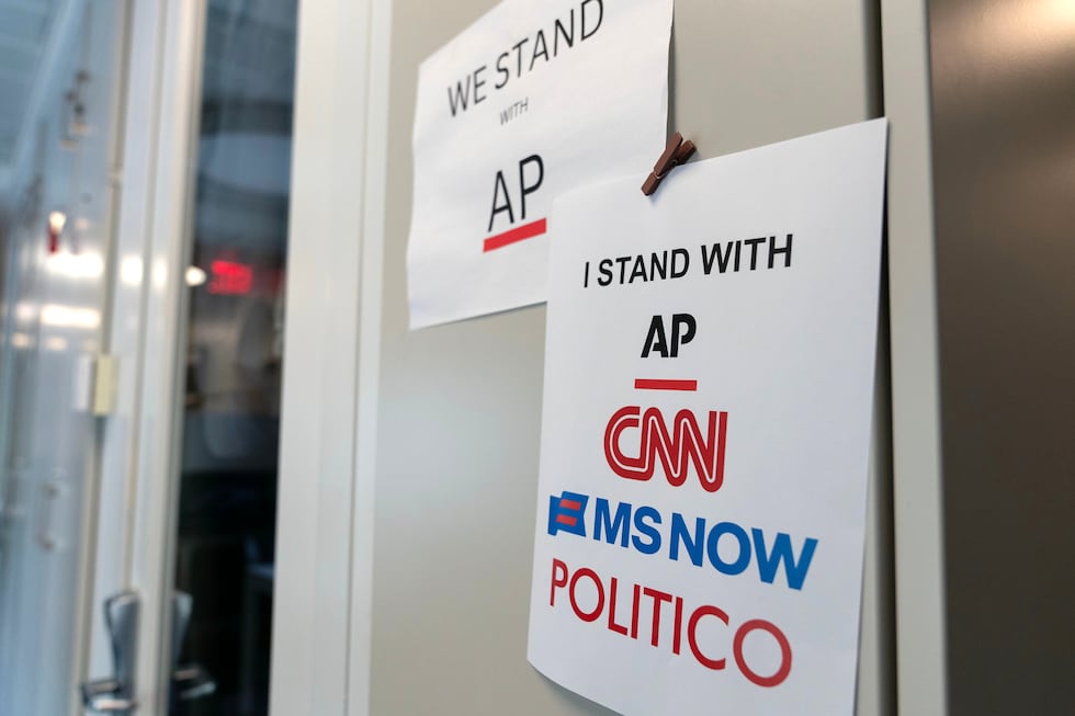 A sign in support of news outlets is seen at the White House press room, Sept. 19, 2026, in...