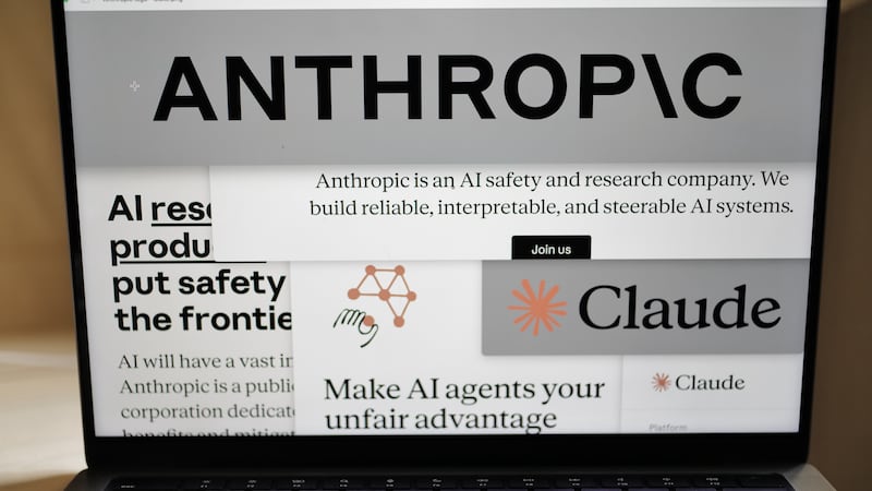 FILE - Pages from the Anthropic website and the company's logos are displayed on a computer...