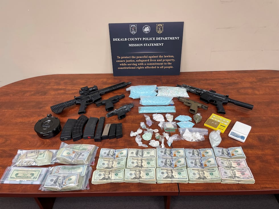 A multi-hour operation led DeKalb County Police to three residences housing guns, drugs and cash.