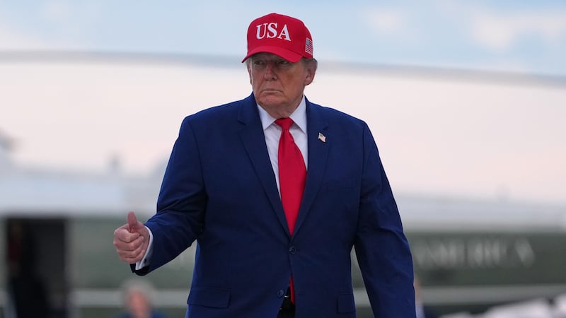 ARCHIVO | President Donald Trump walks from Marine One to board Air Force One, Friday, Oct....
