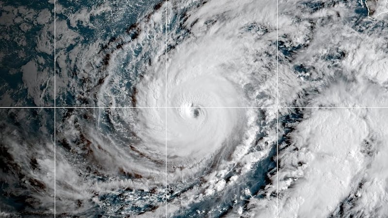 Hurricane Lowell satellite image approaching Hawaii's Kauai and Niihau islands under hurricane...